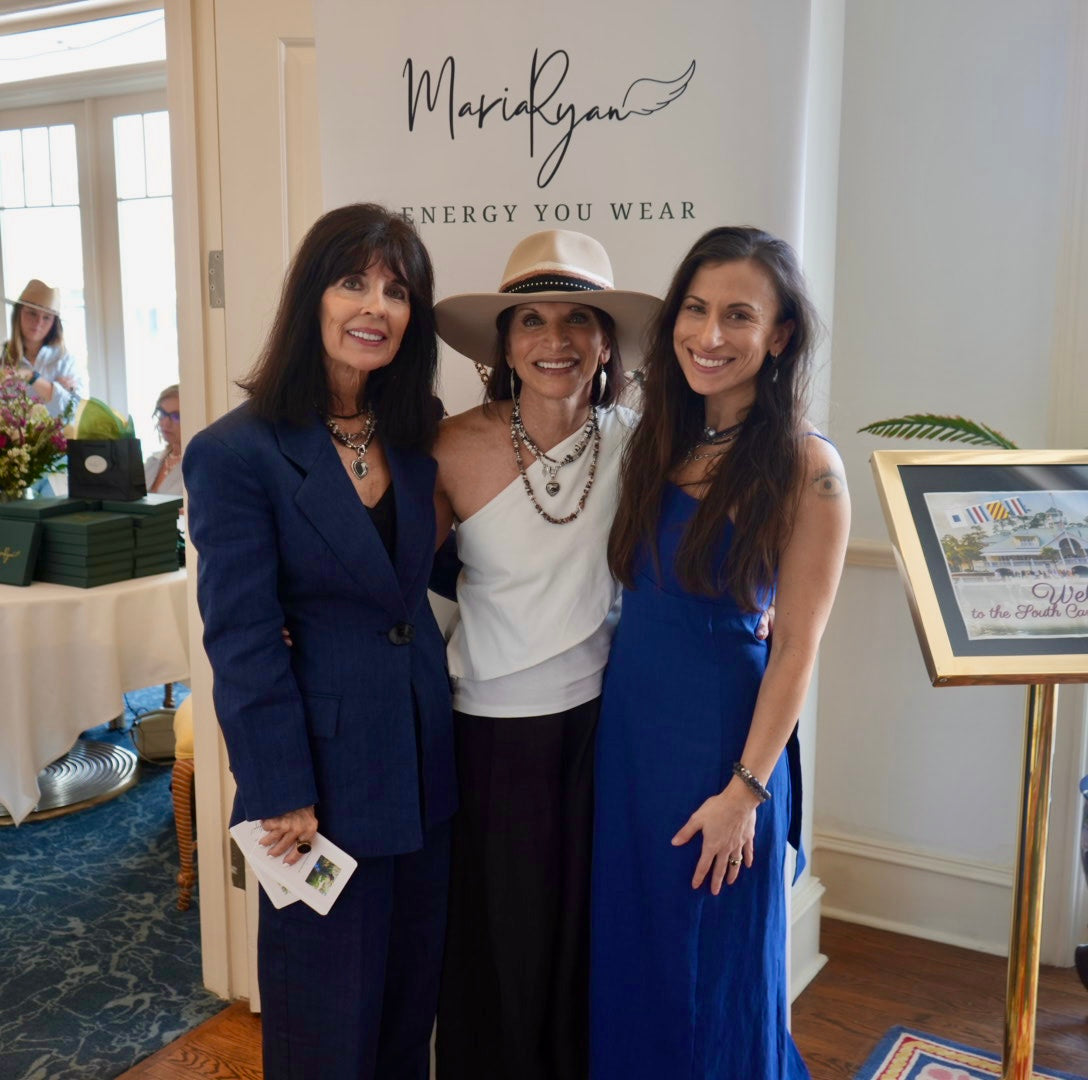 Maria Ryan Jewelry sign with Mary Ryan standing alongside two women at her recent trunk show