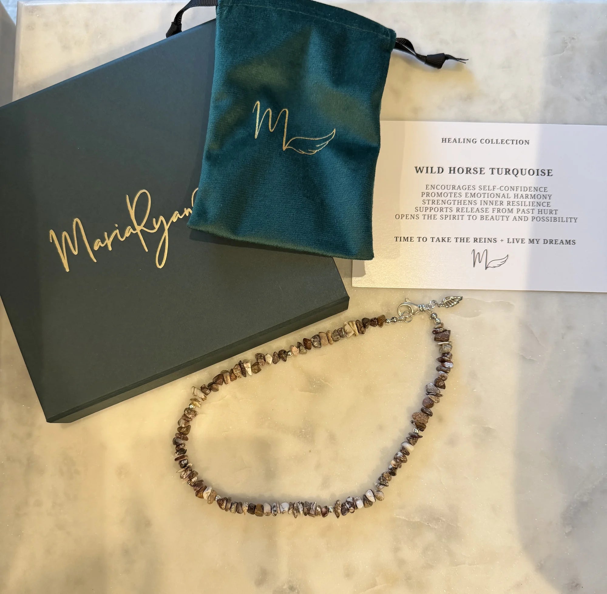 MariaRyan Jewelry pouch and box with a card that explains the jewelry piece and it's significance